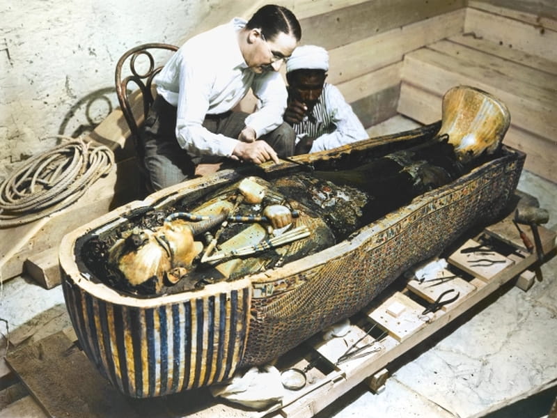 English archaeologist Howard Carter enters the sealed burial chamber of the ancient Egyptian ruler King Tutankhamen